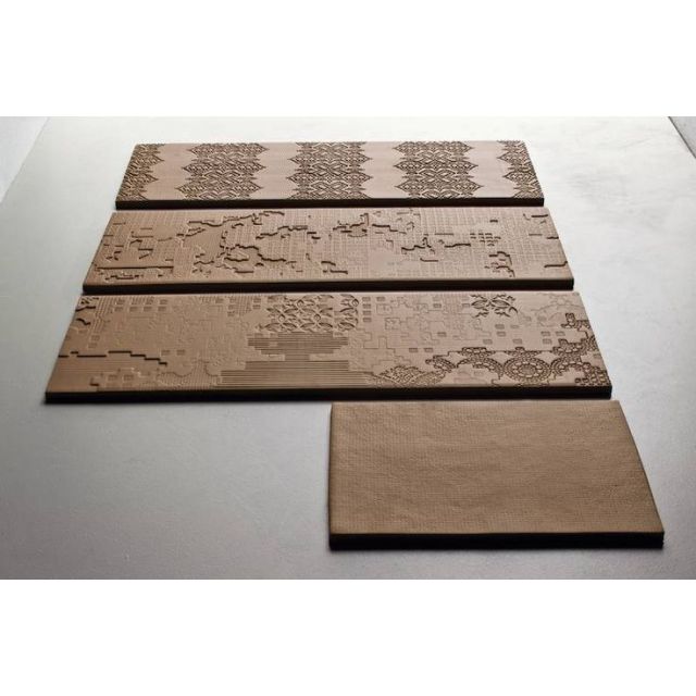 Piastrella MUTINA Serie Bas-Relief 18x54 patchwork relief nera effetto moderno PUBP01